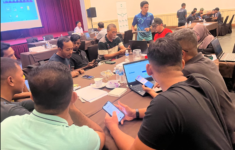 Practical workshop evidence showing participants setting up and managing social media platforms for community-based ecotourism promotion.